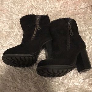 Black boots with zippers on both sides